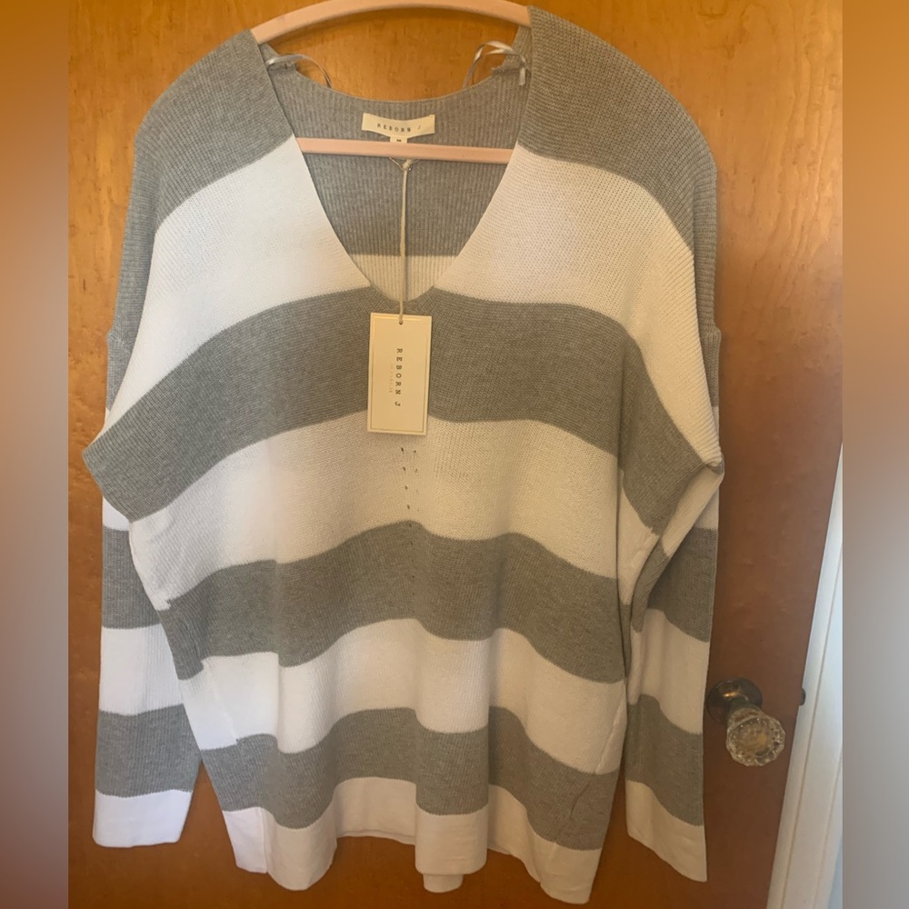 Grey and white sweater